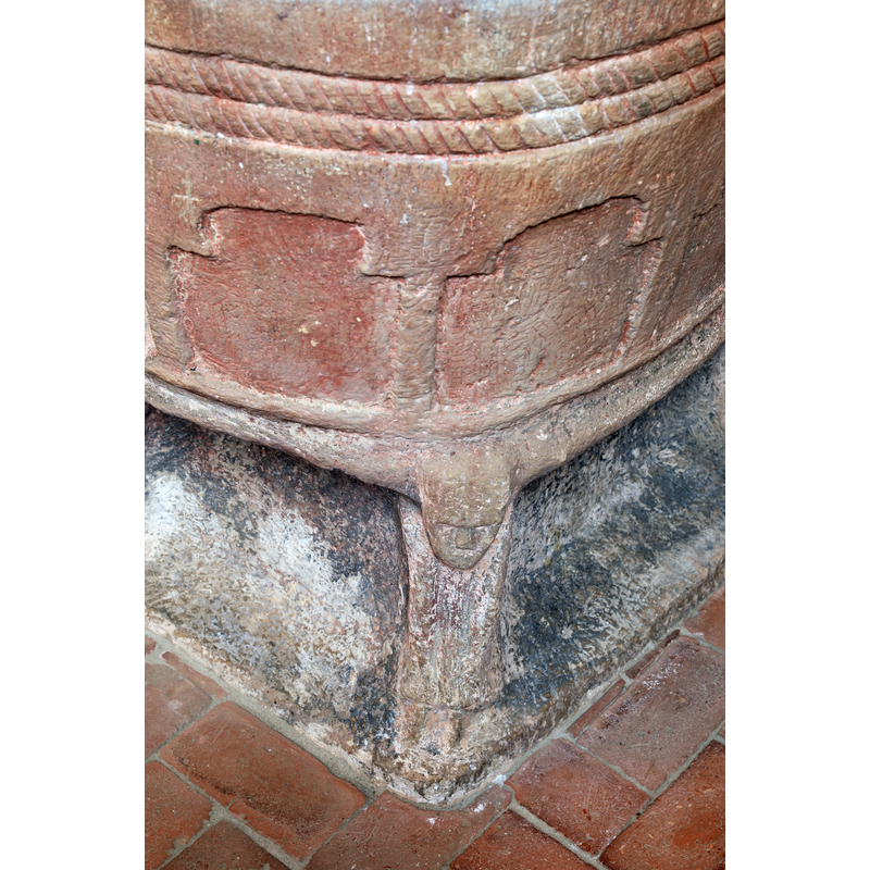 very irregular arch heads, some appearing to be horseshoe-shape; columns devoid of decoration