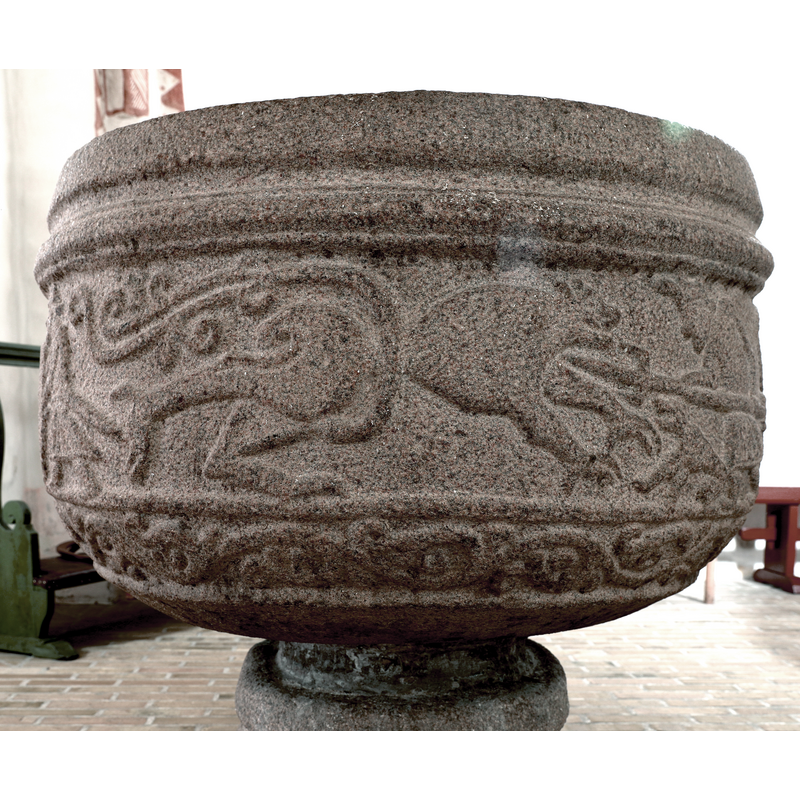 partial scene:a hunter spearing an unidentified animal with one end of his lance, while the other end, which appears to be the pointy one, pierces the back of a rampant long-horned animal to the right; the lancer is accompanied by a dog, which also appears to be attacking the unidentified animal to the left [cf, FontNotes]