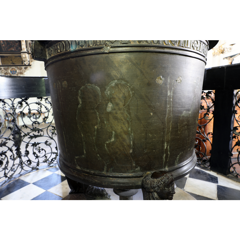 showing the traces of the figural decorations removed