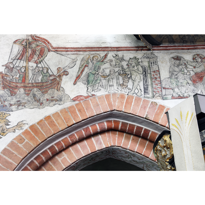 the restored late-medieval mural paintings on the north wall