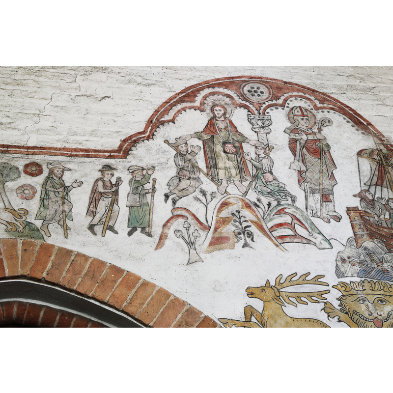the restored late-medieval mural paintings on the north wall