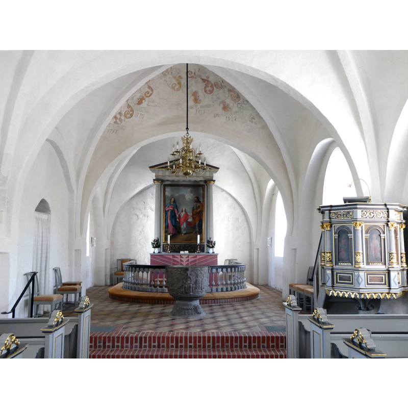 showing the baptismal font in the centre