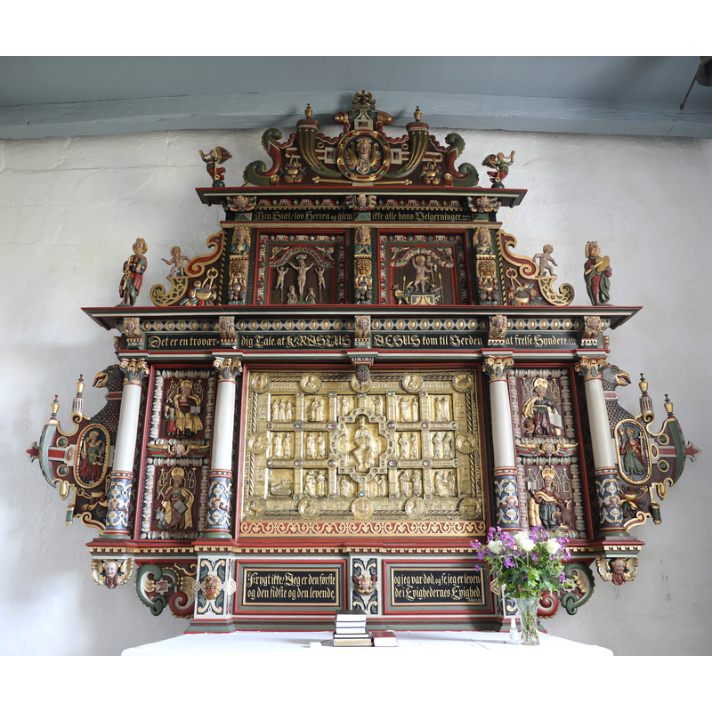 showing the original altar frontal now incorporated into the retable