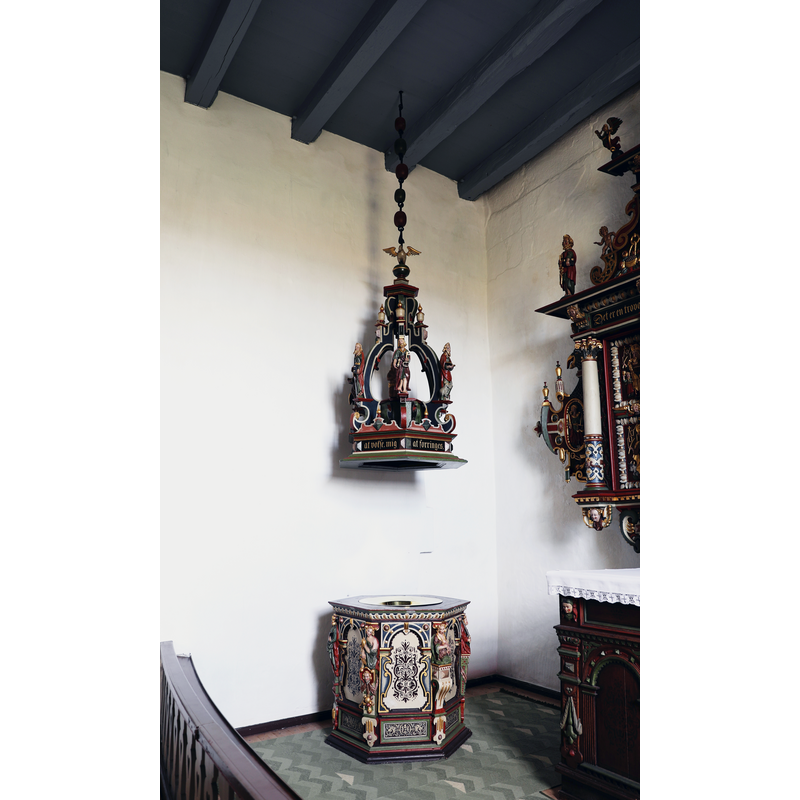 showing the mid-17thC(?) disused font and cover in the NE corner of the chancel