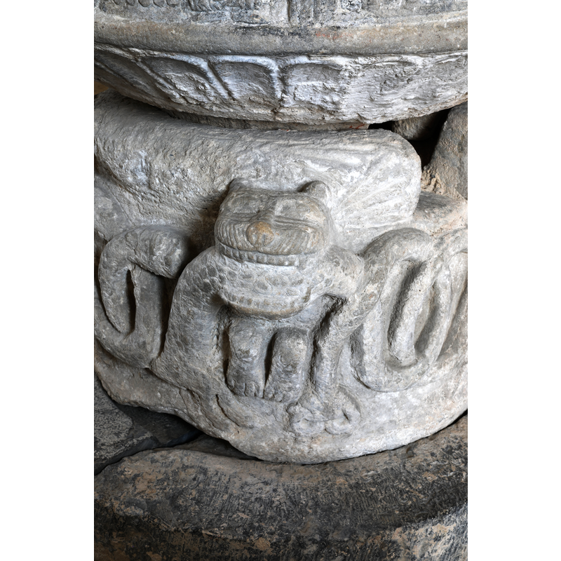 showing the animal biting the body of the snake thta loops all around, the drain opening on the base; showing also the flat-rib pattern around the underbowl