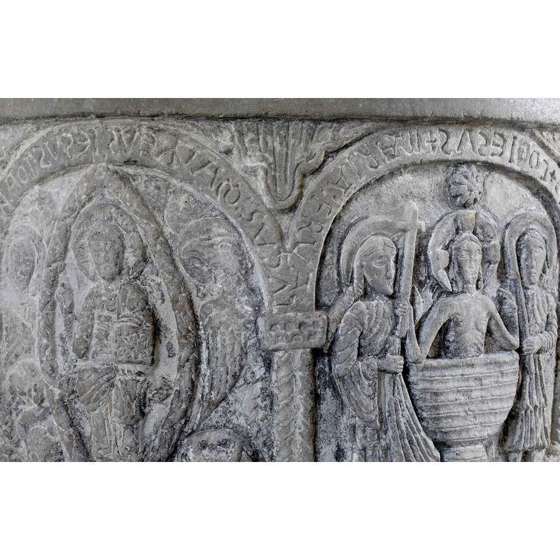 close-up of the two inscribed arch-heads over the Majestas Domini and the First Bath