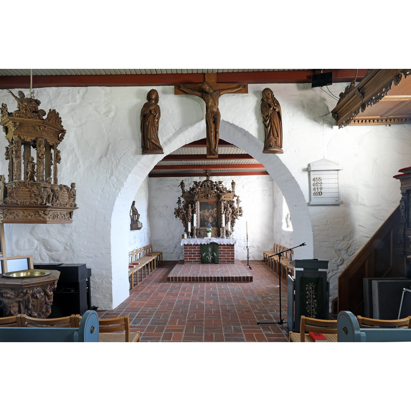 showing the 17thC font and cover on the left, in the northwest corner of the nave