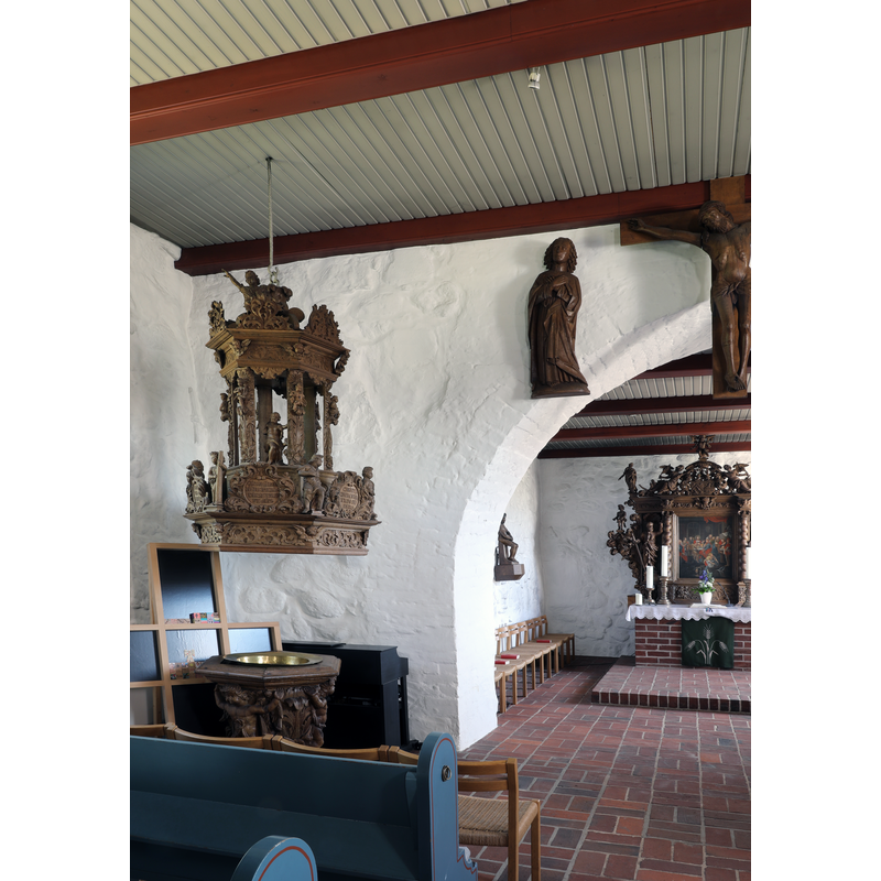showing the 17thC font and cover on the left, in the northwest corner of the nave