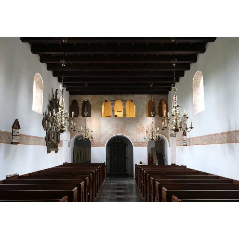 the paintings on the west wall are faint but they appear to be related to the Baltic Crusades (HST)