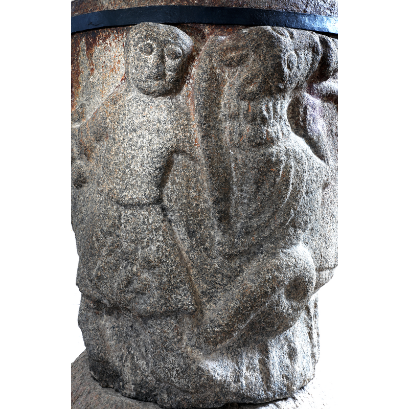 the shield held in the warrior's left arm is partially discernible here