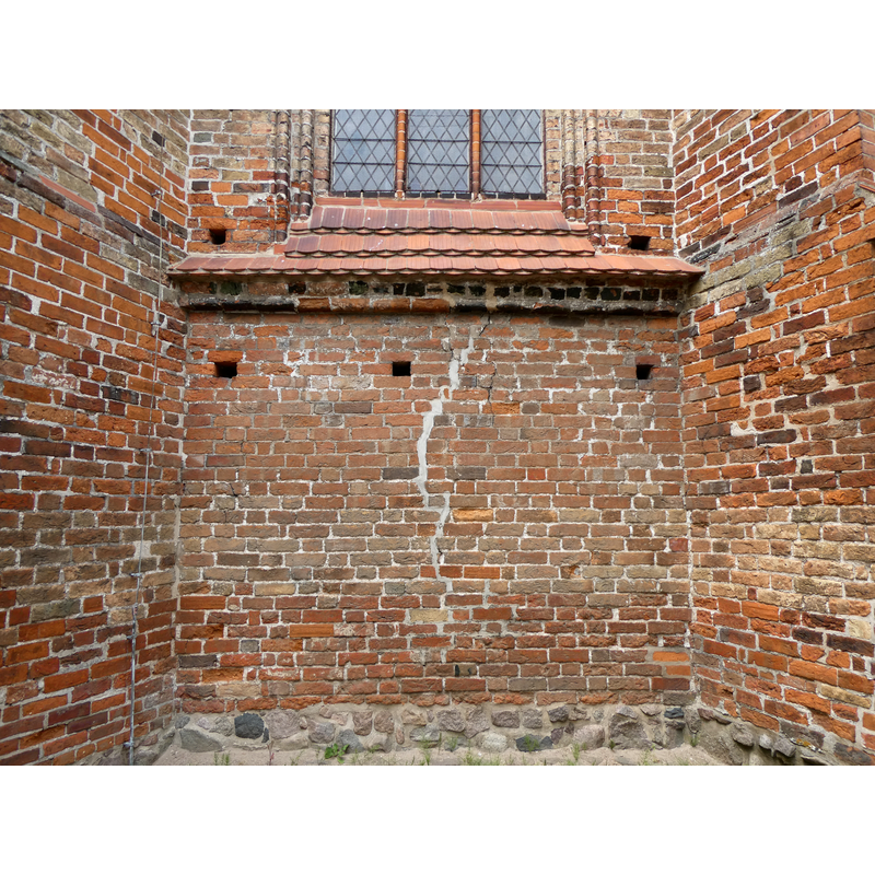 showing the boulder foundations used in the construction of the medieval church here