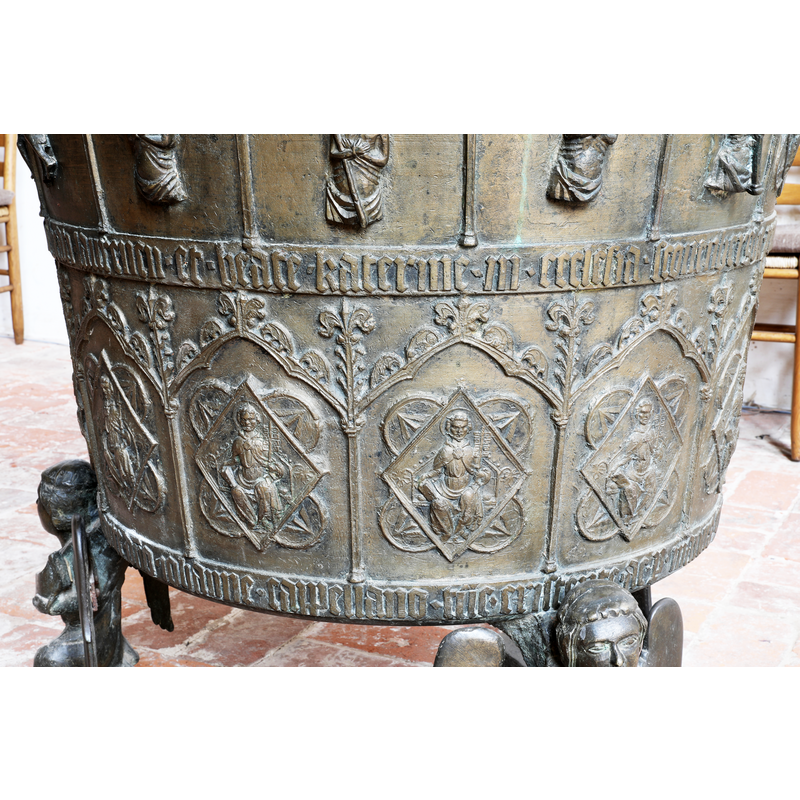 the inscription in the middle includes the date of the font, 1357, in Roman numerals