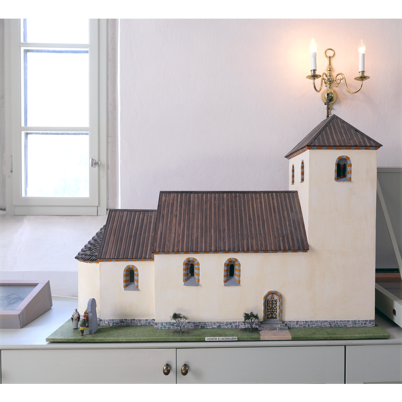 a maquette of the 13thC church kept inside the 19thC church