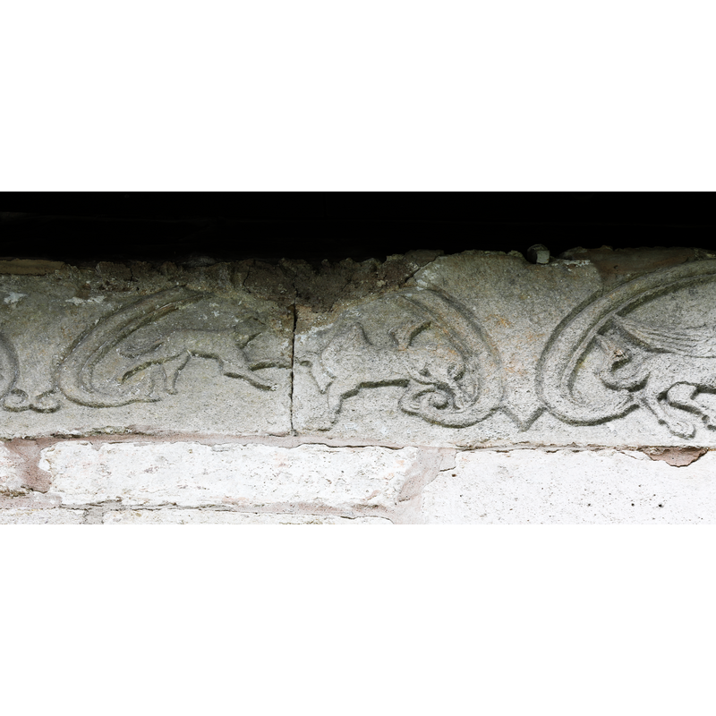 carved stones originally from the Romanesque church that were incorporated into the Gothich church; they are characteristic of the Byzantios workshop of Gotland