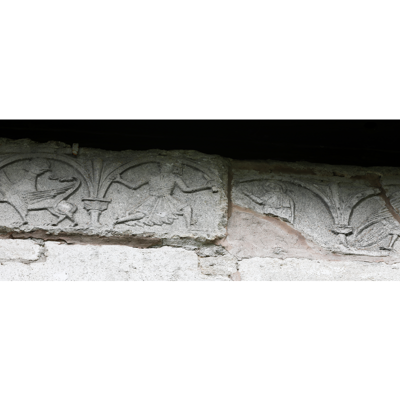 carved stones originally from the Romanesque church that were incorporated into the Gothich church; they are characteristic of the Byzantios workshop of Gotland