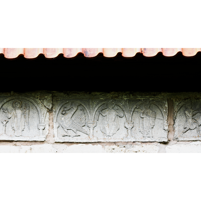 carved stones originally from the Romanesque church that were incorporated into the Gothich church; they are characteristic of the Byzantios workshop of Gotland