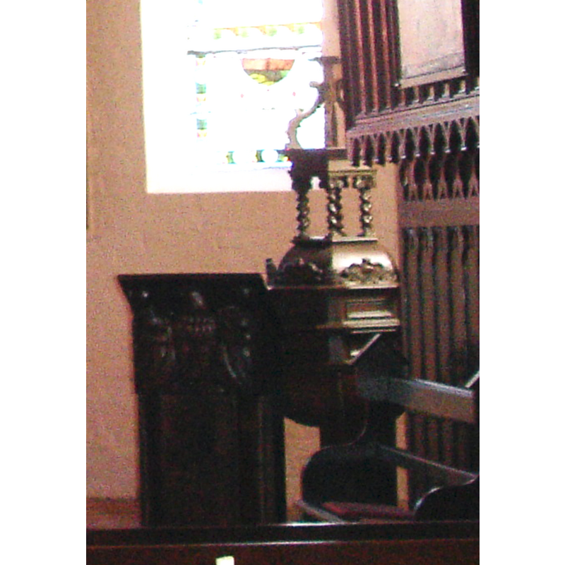 showing the wooden font and cover by the right window of the chancel