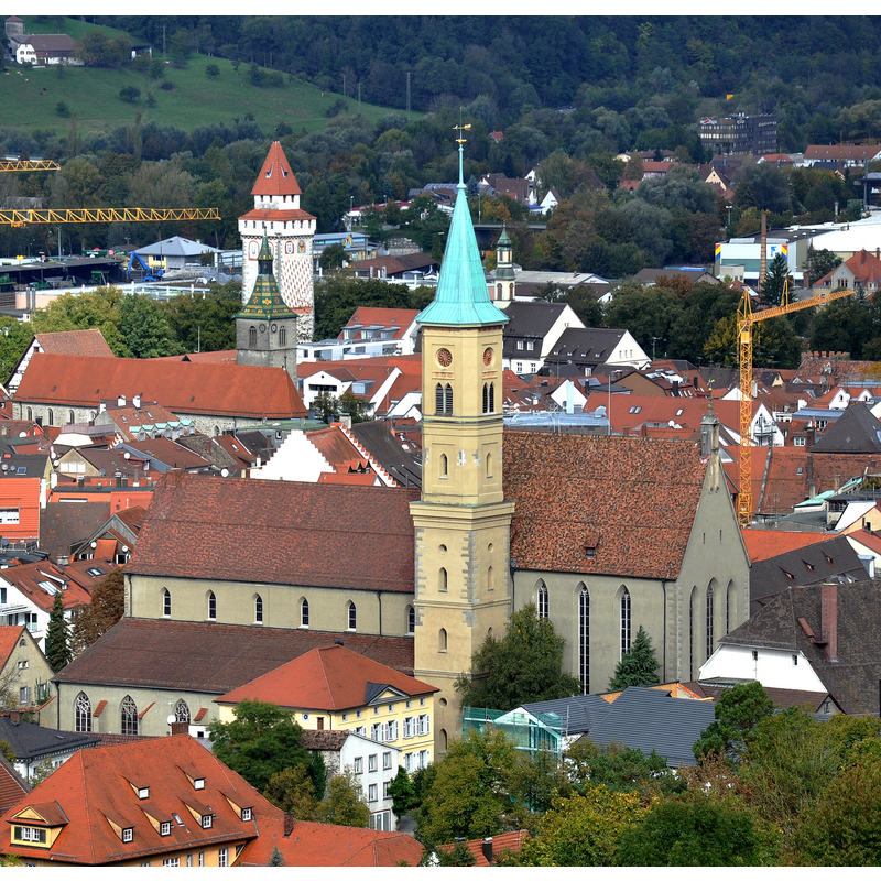 Source caption: "Ravensburg, Evangelische Stadtkirche (und Jodkoskirche sowie Gemalter Turm), von St Christina aus gesehen"