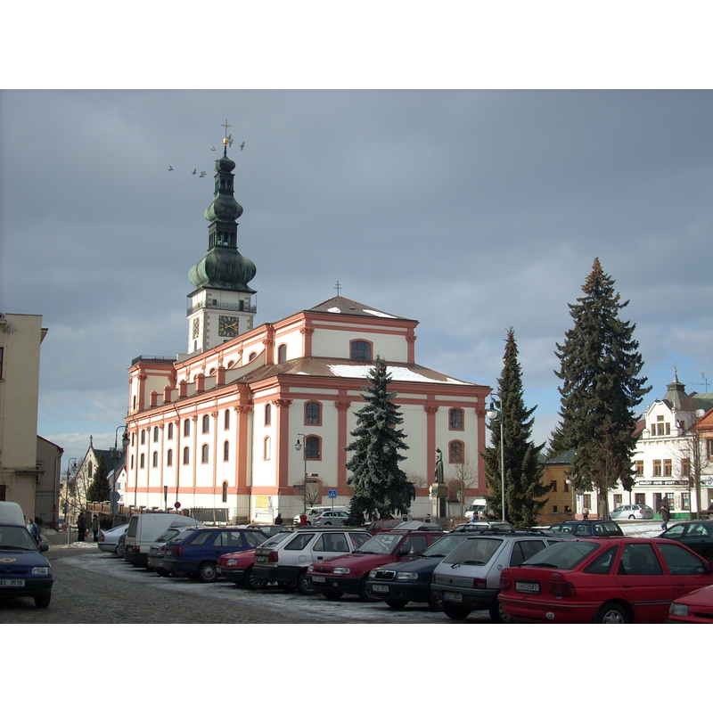 Source caption: "Polná, okres Jihlava. Kostel Nanebevzetí Panny Marie, Husovo náměstí."