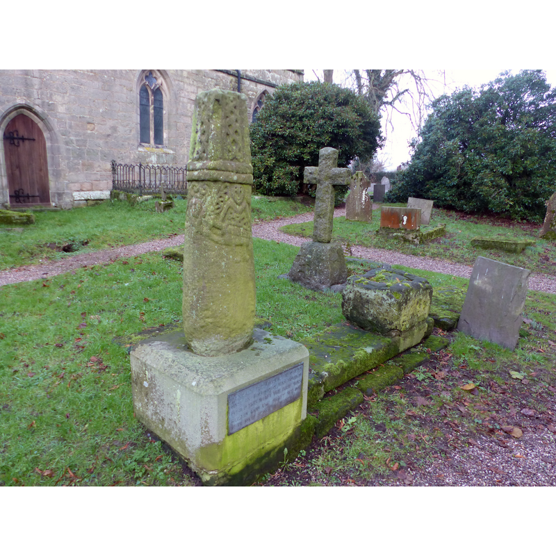 Source caption: "Anglo-Scandinavian high cross shaft and medieval cross base in the churchyard of All Saints' Church"