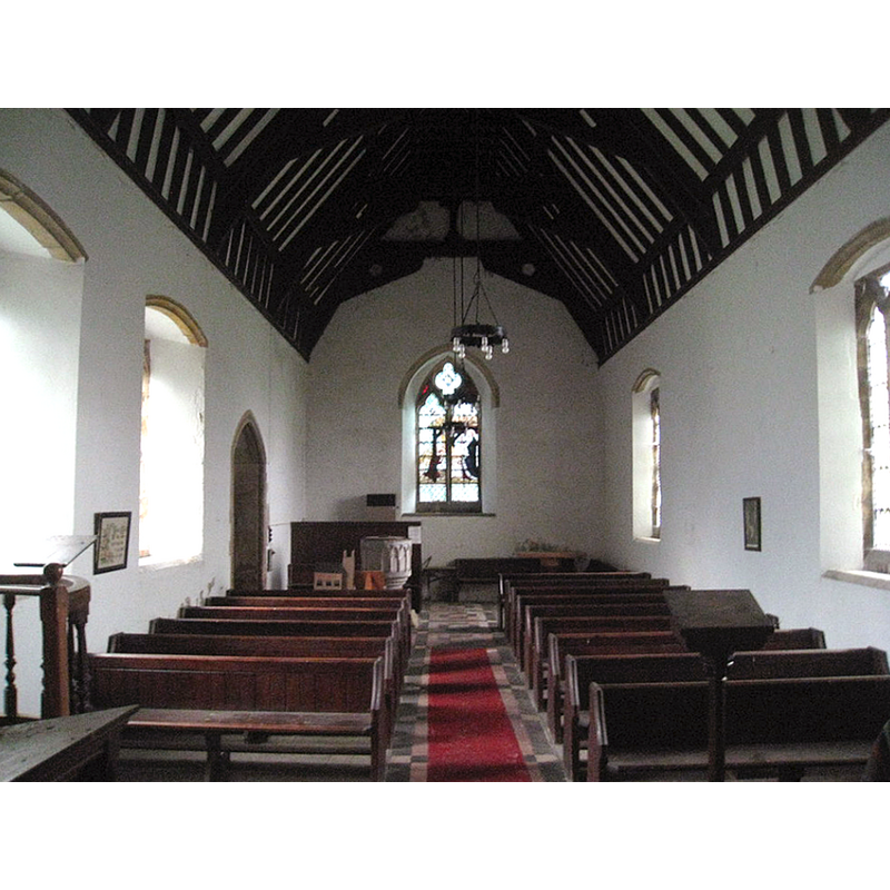 Source caption: "The nave, West Torrington Parish Church. This church is going through the process of being declared redundant." -- showing the font at the far end, left [south] side