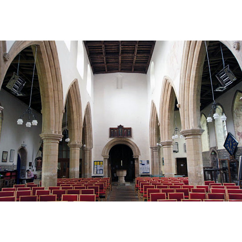 Source caption: "Looking towards the west end. It is the small triangular-headed block doorway high on the west wall that gives the vital clue to the provenance of this church: it is clearly Anglo-Saxon. This tells you that that the nave walls, now cut by arcades, were the original Anglo-Saxon church. It is hard not to wonder whether the clerestory was “built” at all. Were the windows simply cut into the original Anglo-Saxon walls? In any event, look at the level of that Anglo-Saxon doorway and imagine then the sheer height of that church compared to its original aisle-less breadth!"