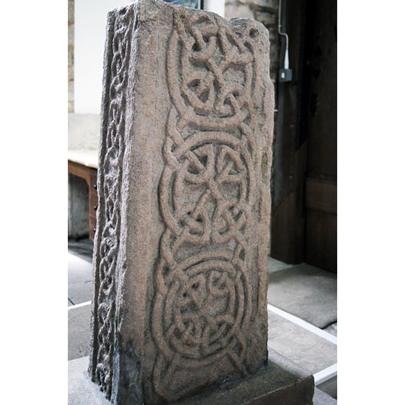 Source caption: "This lovely Scandinavian-style interlaced work is in stark contrast to the crudeness of the main crucifixion image."