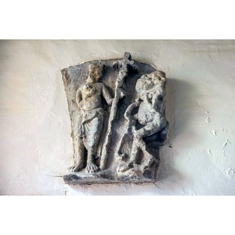 Source caption: "Norman carving of St Peter"