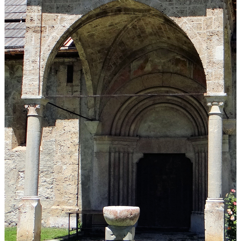 Source caption: "Les Vigneaux - Église Saint-Laurent - Ensemble de la façade sud" [detail] -- an older font located outside, by the south entranceway [cf. FontNotes]