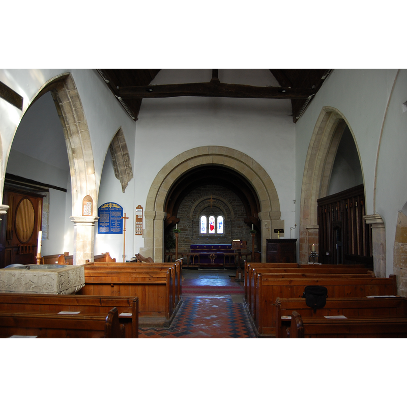 Source caption: "Interior, St Peter's church, Newenden. Showing the modern chancel."