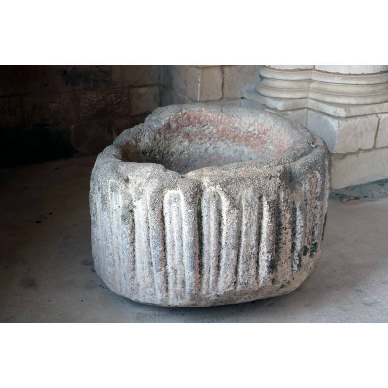 Source caption: "Airvault - Eglise Saint-Pierre" -- [NB: we have no information on this vessel; it is located in the abbey church and it is quite likely an old damaged and eroded font]