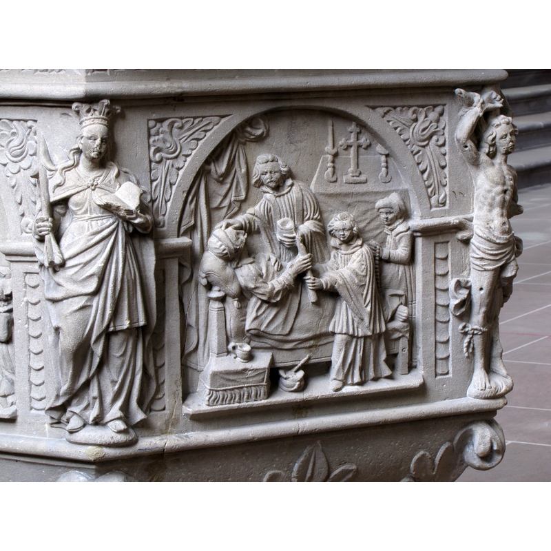 Source caption: "Alsace, Bas-Rhin, Église Saint-Georges de Molsheim, ancienne église des Jésuites (1618) [...] Fonts baptismaux (1624): Extrême onction." -- showing L-->R: St Ursula --> Extreme Unction --> St Sebastian