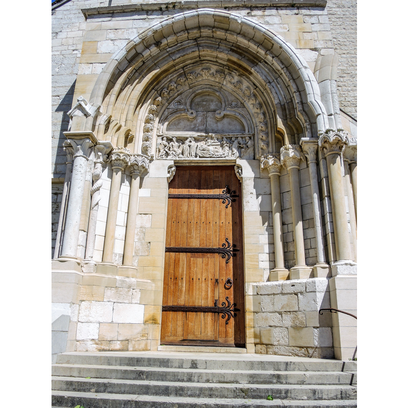 Source caption: "Porche de gauche, de la façade de l'abbatiale d'Ambronay. Ain"
