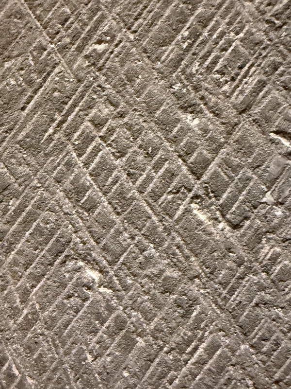 showing the texture of the carved stone