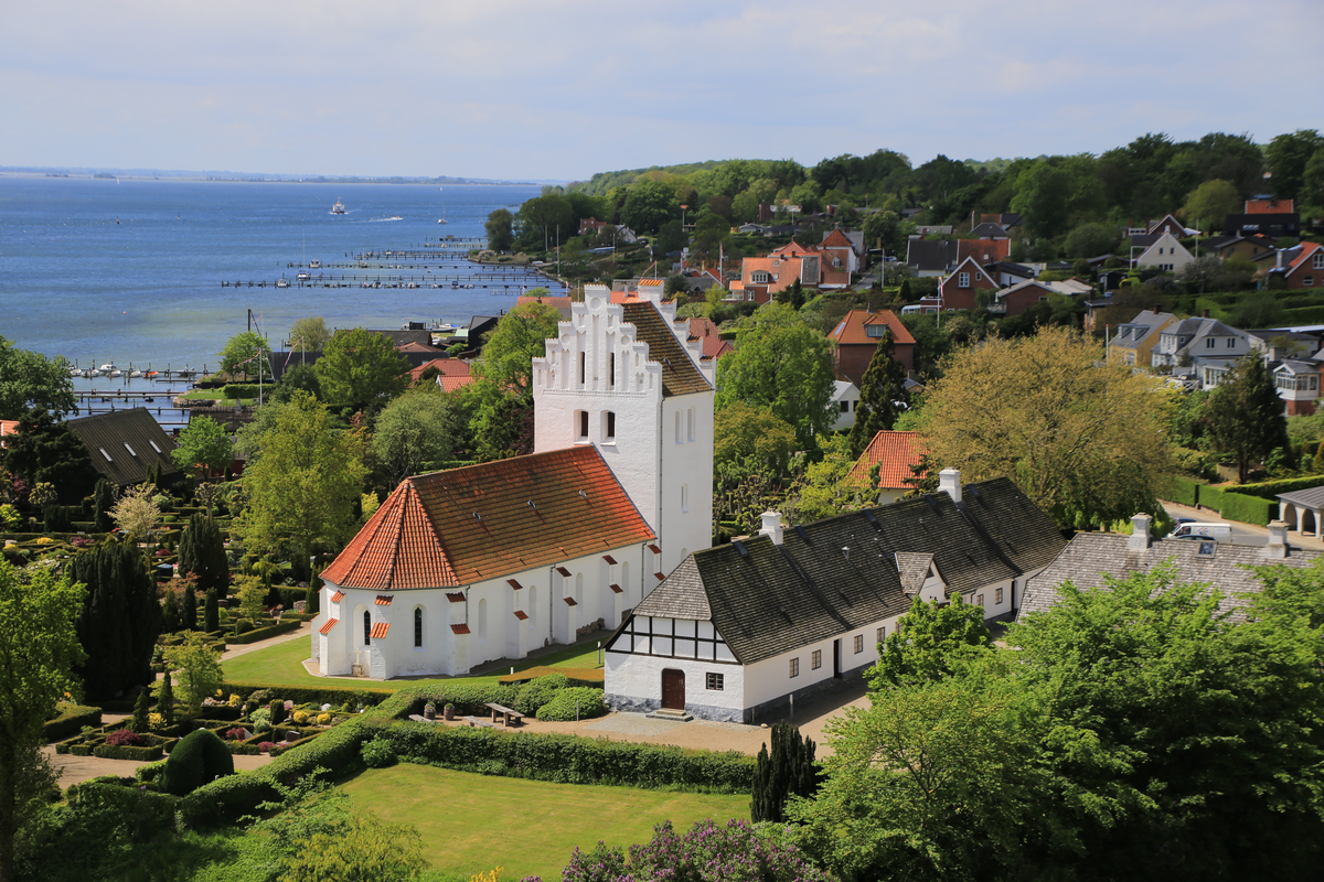 "Sankt Jørgens Kirke i Svendborg på Fyn, set fra Svendborgsundbroen / Sankt Jørgens church in Svendborg on Funen in Denmark, seen from the Svendborgsund bridge."
