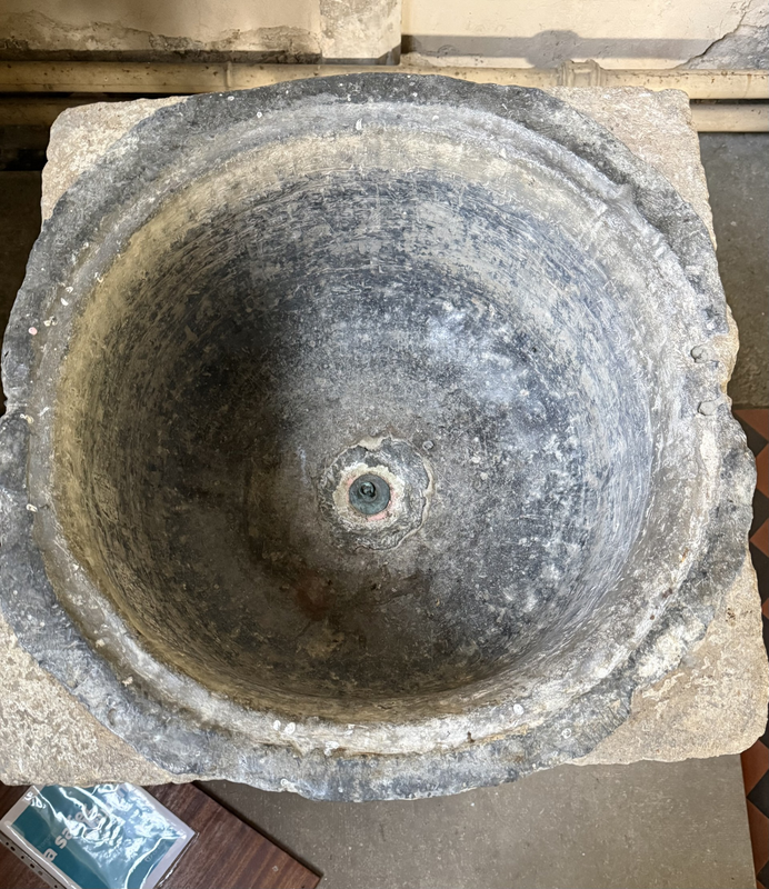 showing the lead lining and the drain hole