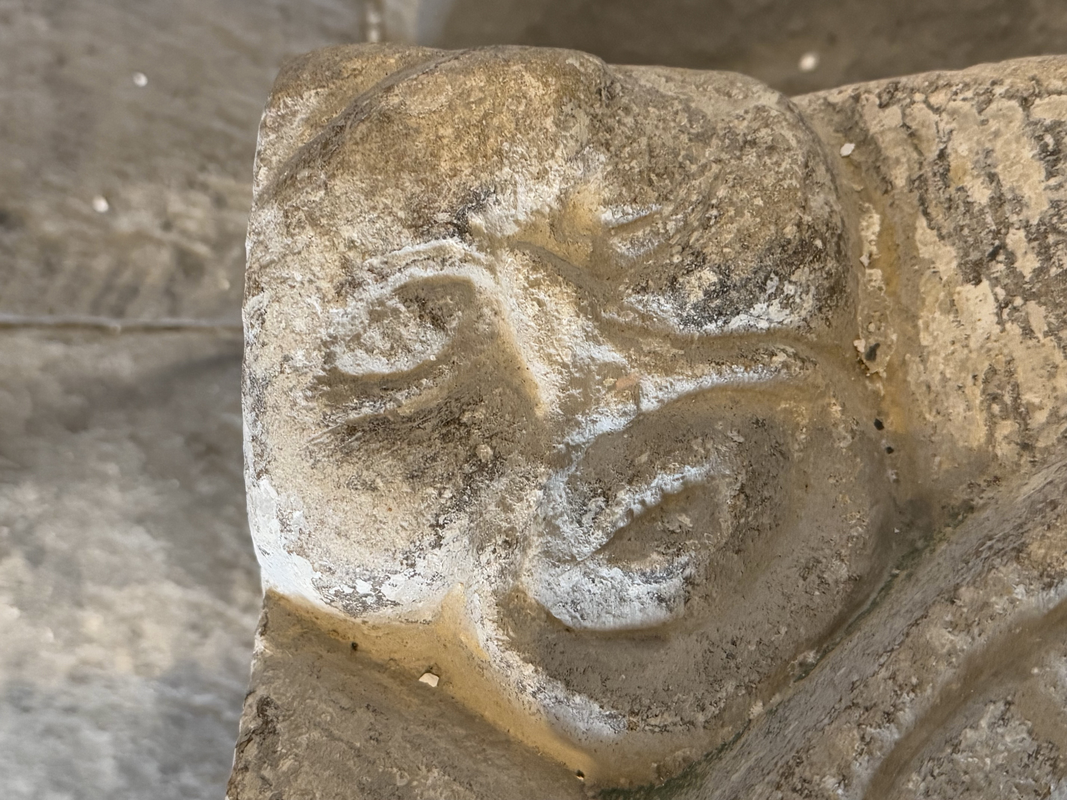 on the upper corners of the lower base, looking up