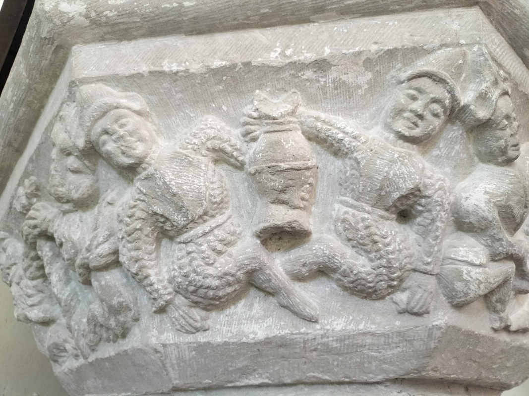 three (?) of them involve pairs of humans; one(?) appears to have animals (lions?) instead