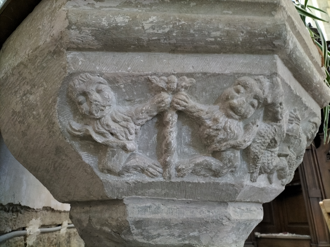 three (?) of them involve pairs of humans; this one appears to have animals (lions?) instead