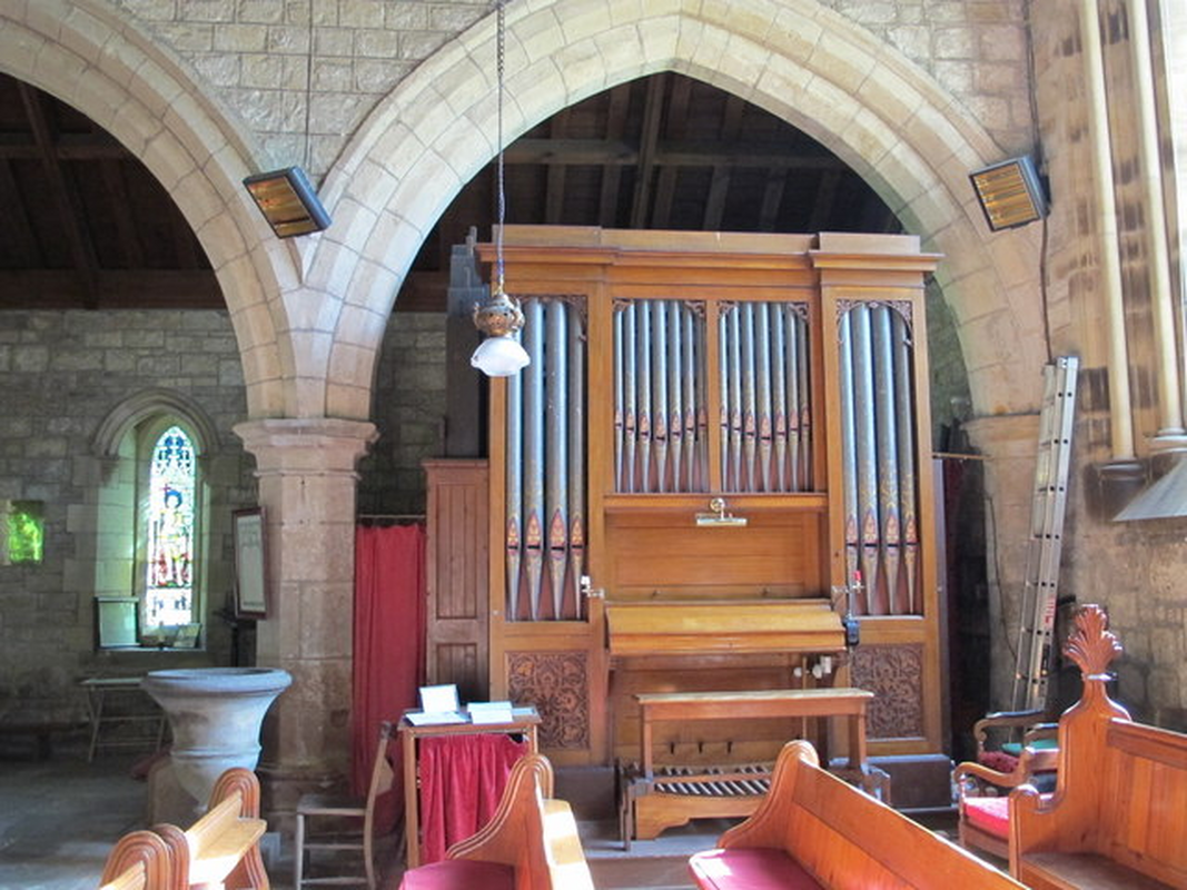 "St. Mungo's Church, Simonburn - organ and Georgian font" [cf. FontNotes]