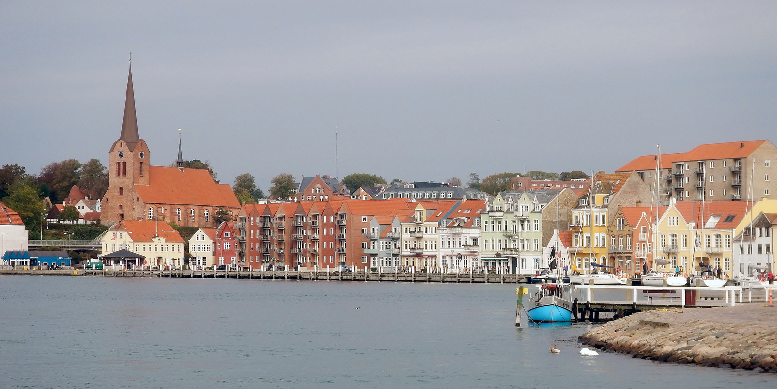 "Sønderborg Havn" -- view of the harbour and harbourfront area of Sønderborg in 2015; the church on the left is St. Mary's -- the church of St. Nicholas was demolished in the late-16thC