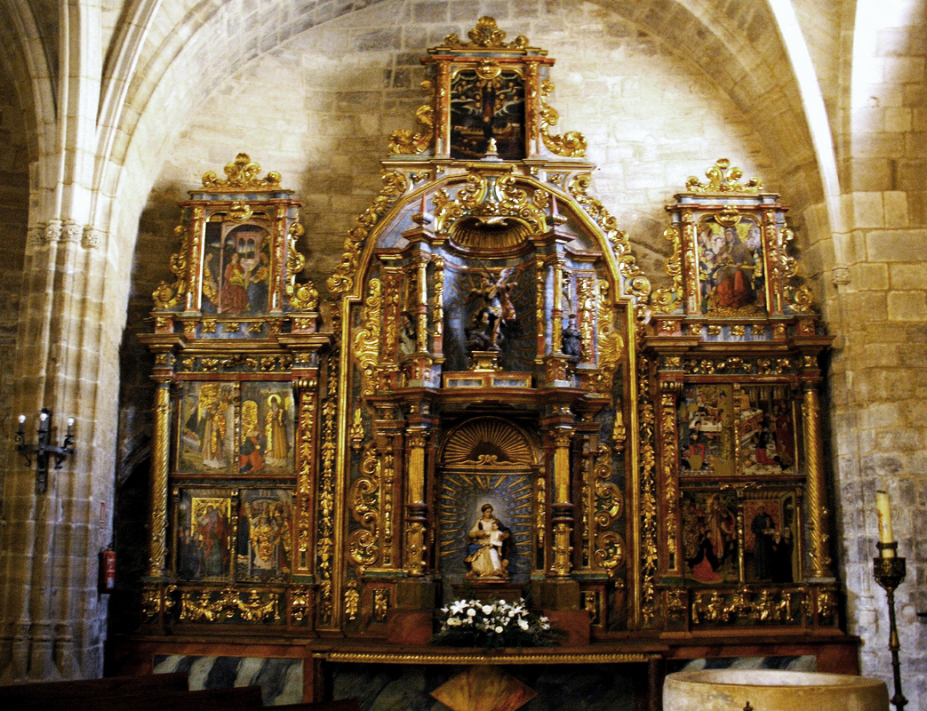 "Retablo en la iglesia de San Nicolás de Bari (Burgos)" -- showing the top of the basin of the baptismal font in the bottom-right corner of the image