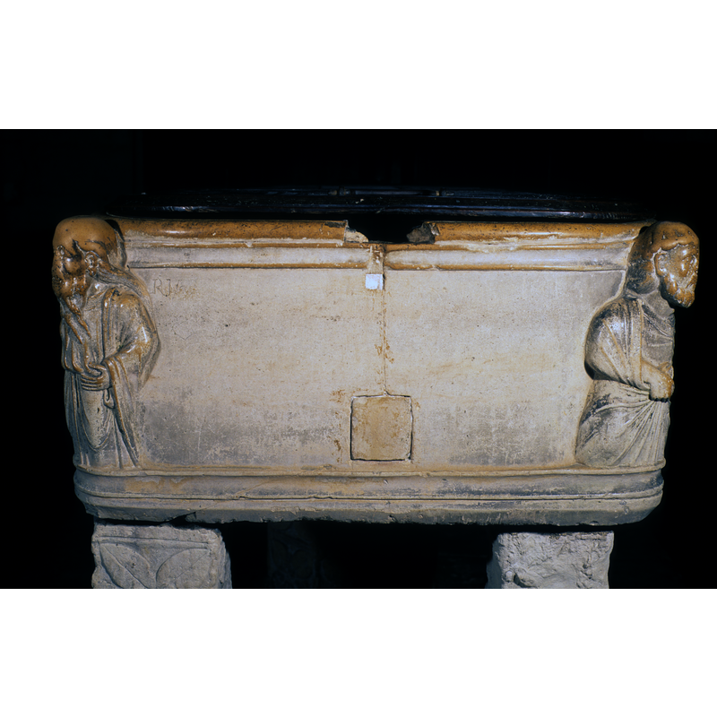 showing damage to the upper rim and insert-stone repair below