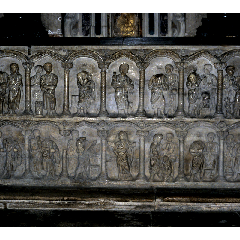 on the front of the sarcophagus-altar-font -- angle arch-heads alternate with round ones; most (?) of the columns are decorated with torsade pattern