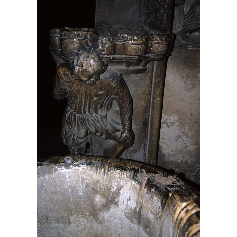 with the upper end of the well-head in the foreground