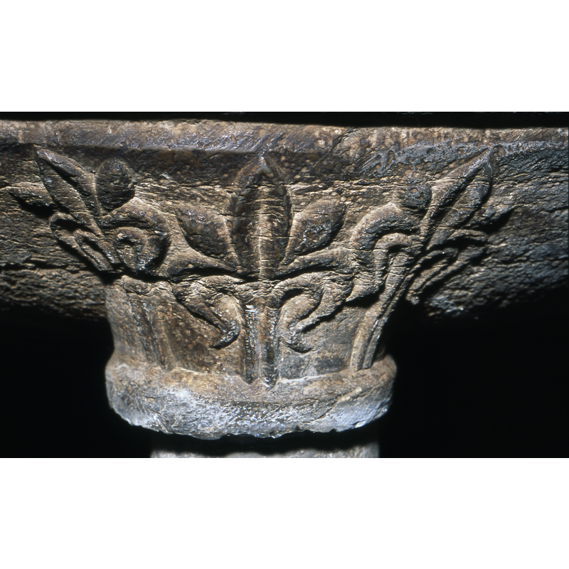 on some of the capitals of the outer columns of the base