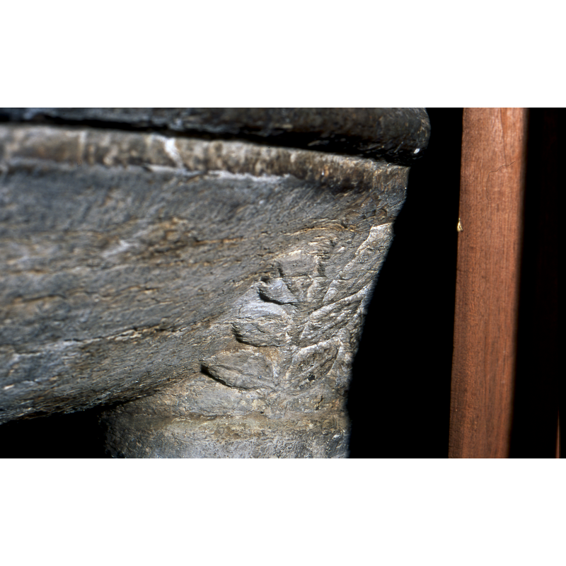 on some of the capitals of the outer columns of the base