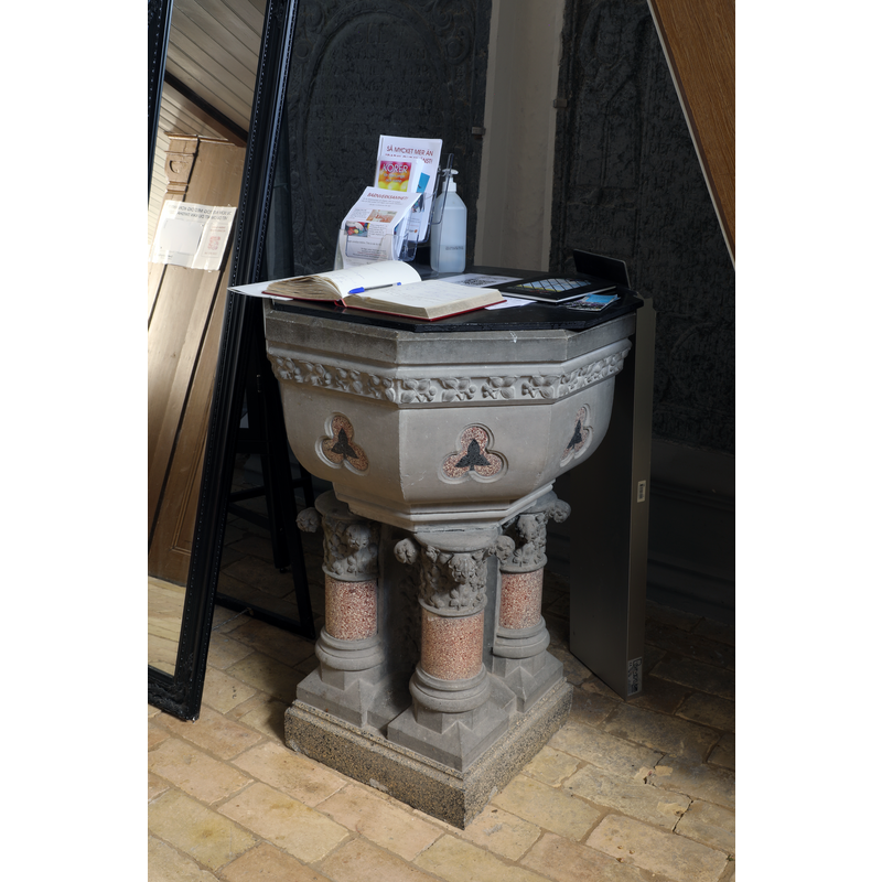 the disused modern font now installed in the vestibule