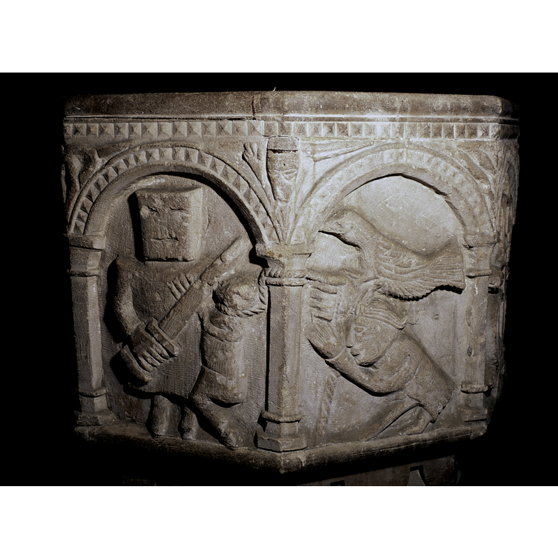the rope tied around the neck of the victim (?) appears to be tied to the capital of the right column and, from there, to be hed by the bird and the man in the next arch