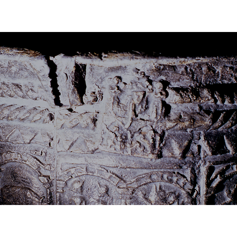 one of the three little plates welded to the upper basin side: Crucifixion scene? [cf. FontNotes]